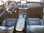 ✅ 2019 Kia Stinger • VIN: KNAE15LA6K6045171 • Лот: 90023715. Опубликован ранее на Copart с пробегом 59 259 миль. Бесплатный доступ к архиву аукционных продаж из США и подробный отчёт об истории автомобиля на DreamBid. Изображение 8.