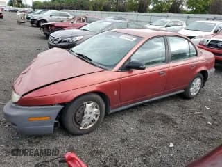 ✅ 1997 Saturn SL • VIN: 1G8ZH5285VZ188074 • Лот: 51501005. Опубликован ранее на Copart с пробегом 125 973 миль. Бесплатный доступ к архиву аукционных продаж из США и подробный отчёт об истории автомобиля на DreamBid. Изображение 1.