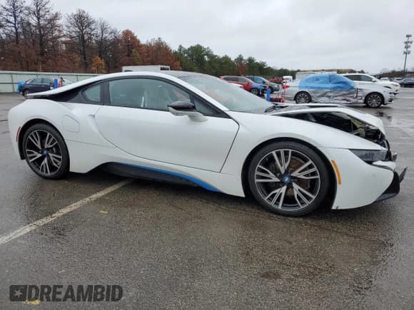 ✅ 2015 BMW i8 • VIN: WBY2Z2C53FV391673 • Лот: 45827224. Опубликован ранее на Copart с пробегом 16 299 миль. Бесплатный доступ к архиву аукционных продаж из США и подробный отчёт об истории автомобиля на DreamBid. Изображение 4.
