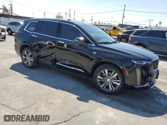 ✅ 2022 Cadillac XT6 Premium Luxury • VIN: 1GYKPCRS7NZ127593 • Lot: 82125545. Wystawiony na Copart z przebiegiem 167 468 mil. Bezpłatny archiwum sprzedaży aukcyjnych z USA i szczegółowy raport historii pojazdu na DreamBid. Zdjęcie 4.