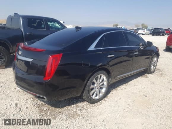 ✅ 2017 Cadillac XTS Luxury • VIN: 2G61M5S30H9140745 • Lot: 66521855. Listed on Copart with 77,210 mi. Free auction sales archive from the USA and detailed vehicle history report at DreamBid. Image 3.