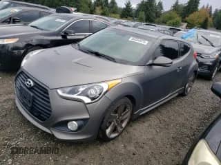 2015 Hyundai Veloster Turbo с VIN KMHTC6AEXFU237769, выставлен на аукционе Copart как лот 84004975 с пробегом 98 923 миль миль и Чистый • Clean title. История ставок и продаж доступна на DreamBid. Изображение 1.