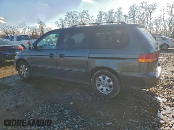 ✅ 2003 Honda Odyssey EX • VIN: 5FNRL18663B042403 • Лот: 93686715. Опубликован ранее на Copart с пробегом 242 883 миль. Бесплатный доступ к архиву аукционных продаж из США и подробный отчёт об истории автомобиля на DreamBid. Изображение 2.