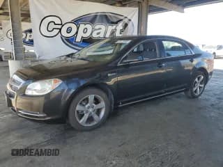 ✅ 2009 Chevrolet Malibu Hybrid • VIN: 1G1ZF57529F129722 • Lot: 69473585. Listed on Copart with 79,097 mi. Free auction sales archive from the USA and detailed vehicle history report at DreamBid. Image 1.