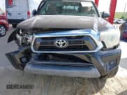 ✅ 2015 Toyota Tacoma • VIN: 5TFUX4EN5FX036792 • Lot: 43338032. Listed on IAAI with 167,320 mi. Free auction sales archive from the USA and detailed vehicle history report at DreamBid. Image 6.