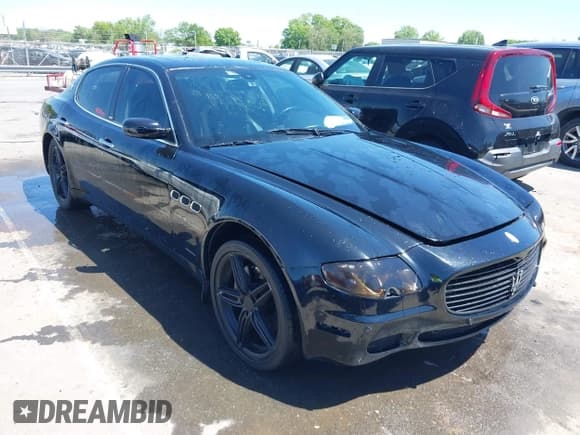 ✅ 2006 Maserati Quattroporte • VIN: ZAMCE39A660024352 • Lot: 42050460. Listed on IAAI with 57,715 mi. Free auction sales archive from the USA and detailed vehicle history report at DreamBid. Image 1.