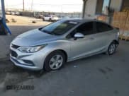 ✅ 2018 Chevrolet Cruze LS • VIN: 1G1BC5SM7J7134731 • Lot: 82364625. Listed on Copart with 84,754 mi. Free auction sales archive from the USA and detailed vehicle history report at DreamBid. Image 1.