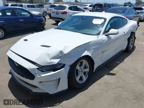✅ 2021 Ford Mustang EcoBoost • VIN: 1FA6P8TH8M5157702 • Lot: 42315710. Listed on IAAI with 45,876 mi. Free auction sales archive from the USA and detailed vehicle history report at DreamBid. Image 2.
