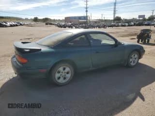 ✅ 1994 Mazda MX-6 • VIN: 1YVGE31D9R5183962 • Lot: 73097704. Wystawiony na Copart z przebiegiem 193 921 mil. Bezpłatny archiwum sprzedaży aukcyjnych z USA i szczegółowy raport historii pojazdu na DreamBid. Zdjęcie 3.