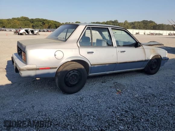 ✅ 1984 Chevrolet Cavalier • VIN: 1G1AD69P3EJ312352 • Lot: 81424985. Listed on Copart with 517,098 mi. Free auction sales archive from the USA and detailed vehicle history report at DreamBid. Image 3.