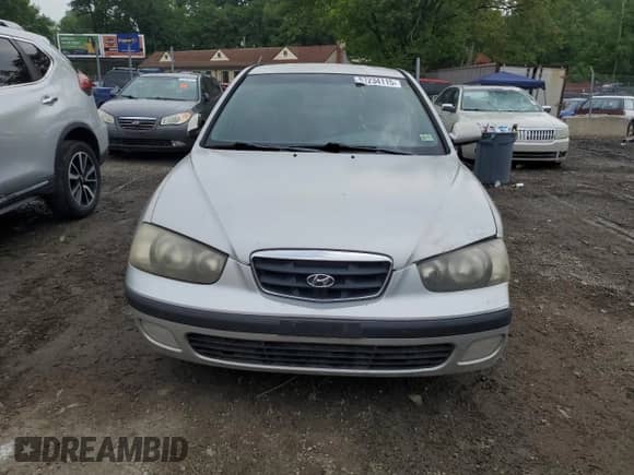 2002 Hyundai Elantra GT z VIN KMHDN55D52U056342, wystawiony jako Copart lot #57234115 z przebiegiem 162 652 mil mil oraz Szkoda całkowita • Salvage title. Historia ofert i sprzedaży dostępna na DreamBid. Obrazek 5.
