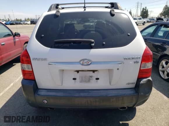 2007 Hyundai Tucson SE z VIN KM8JN72D27U590327, wystawiony jako Copart lot #51072574 z przebiegiem 90 511 mil mil oraz Szkoda całkowita • Salvage title. Historia ofert i sprzedaży dostępna na DreamBid. Obrazek 6.