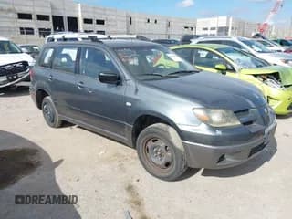 ✅ 2004 Mitsubishi Outlander LS • VIN: JA4LX31F84U026268 • Lot: 42553020. Listed on IAAI with 315,830 mi. Free auction sales archive from the USA and detailed vehicle history report at DreamBid. Image 1.