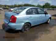 2007 Hyundai Accent GLS z VIN KMHCN46C77U110811, wystawiony jako Copart lot #61494715 z przebiegiem 151 522 mil mil oraz Szkoda całkowita • Salvage title. Historia ofert i sprzedaży dostępna na DreamBid. Obrazek 3.