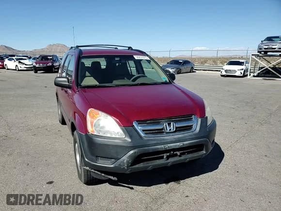 ✅ 2004 Honda CR-V LX • VIN: JHLRD78574C032438 • Lot: 56257075. Listed on Copart with 156,600 mi. Free auction sales archive from the USA and detailed vehicle history report at DreamBid. Image 14.