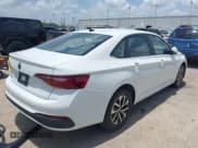 ✅ 2024 Volkswagen Jetta S • VIN: 3VW5M7BU3RM041667 • Lot: 42747226. Listed on IAAI with 21,192 mi. Free auction sales archive from the USA and detailed vehicle history report at DreamBid. Image 4.