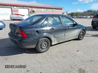✅ 2003 Ford Focus LX • VIN: 1FAFP33P53W180521 • Lot: 43639979. Wystawiony na IAAI z przebiegiem 102 163 mil. Bezpłatny archiwum sprzedaży aukcyjnych z USA i szczegółowy raport historii pojazdu na DreamBid. Zdjęcie 4.