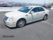 ✅ 2010 Cadillac STS AWD • VIN: 1G6DU6EV5A0147190 • Lot: 42432227. Wystawiony na IAAI z przebiegiem 132 965 mil. Bezpłatny archiwum sprzedaży aukcyjnych z USA i szczegółowy raport historii pojazdu na DreamBid. Zdjęcie 2.