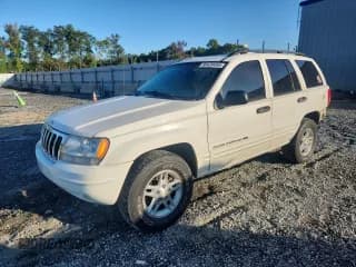 ✅ 2002 Jeep Grand Cherokee Laredo • VIN: 1J4GW48S52C328777 • Lot: 80439455. Listed on Copart with 174,490 mi. Free auction sales archive from the USA and detailed vehicle history report at DreamBid. Image 1.