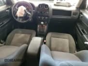 ✅ 2015 Jeep Patriot Latitude • VIN: 1C4NJPFB0FD328802 • Lot: 80837495. Listed on Copart with 198,691 mi. Free auction sales archive from the USA and detailed vehicle history report at DreamBid. Image 8.