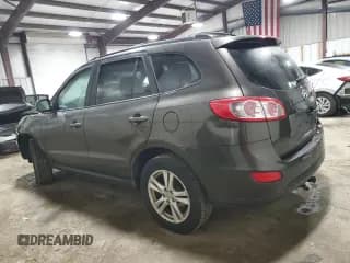 ✅ 2011 Hyundai Santa Fe SE • VIN: 5XYZHDAG8BG061824 • Lot: 77025964. Listed on Copart with 149,741 mi. Free auction sales archive from the USA and detailed vehicle history report at DreamBid. Image 2.