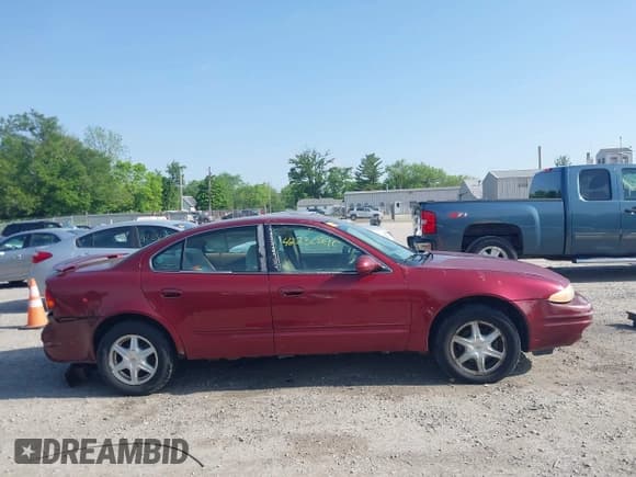 ✅ 2002 Oldsmobile Alero GL1 • VIN: 1G3NL52E02C215561 • Lot: 42230290. Wystawiony na IAAI z przebiegiem 177 176 mil. Bezpłatny archiwum sprzedaży aukcyjnych z USA i szczegółowy raport historii pojazdu na DreamBid. Zdjęcie 14.