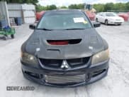 ✅ 2005 Mitsubishi Lancer Evolution VIII • VIN: JA3AH86D05U021760 • Lot: 42974254. Wystawiony na IAAI z przebiegiem Nie podano. Bezpłatny archiwum sprzedaży aukcyjnych z USA i szczegółowy raport historii pojazdu na DreamBid. Zdjęcie 6.