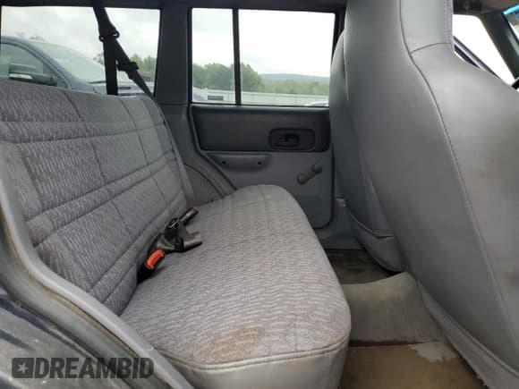 ✅ 1997 Jeep Cherokee Sport • VIN: 1J4FJ68S5VL539634 • Lot: 82171165. Listed on Copart with 266,479 mi. Free auction sales archive from the USA and detailed vehicle history report at DreamBid. Image 11.