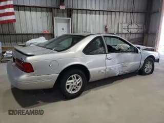 ✅ 1997 Ford Thunderbird LX • VIN: 1FALP62W1VH123205 • Лот: 76107654. Опубликован ранее на Copart с пробегом 120 225 миль. Бесплатный доступ к архиву аукционных продаж из США и подробный отчёт об истории автомобиля на DreamBid. Изображение 3.