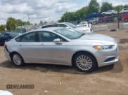 ✅ 2014 Ford Fusion SE Hybrid • VIN: 3FA6P0LU9ER394275 • Лот: 43085443. Опубликован ранее на IAAI с пробегом 160 483 миль. Бесплатный доступ к архиву аукционных продаж из США и подробный отчёт об истории автомобиля на DreamBid. Изображение 13.