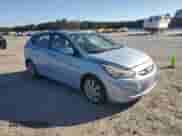 2012 Hyundai Accent SE with VIN KMHCU5AE3CU043488, listed as a Copart auction lot 87283305 with 136,528 mi miles and Salvage title. Bid and sale history available at DreamBid. Image 4.