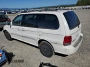 ✅ 2002 Kia Sedona LX • VIN: KNDUP131126201882 • Lot: 69361814. Listed on Copart with Not provided. Free auction sales archive from the USA and detailed vehicle history report at DreamBid. Image 2.