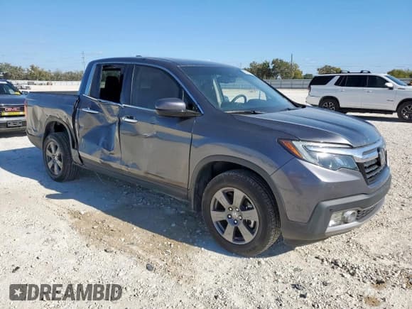 ✅ 2020 Honda Ridgeline RTL-E • VIN: 5FPYK3F72LB011792 • Lot: 92596075. Listed on Copart with 28,748 mi. Free auction sales archive from the USA and detailed vehicle history report at DreamBid. Image 4.