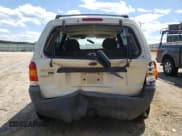 ✅ 2003 Ford Escape XLT Popular • VIN: 1FMYU031X3KD91433 • Lot: 70675795. Listed on Copart with 295,938 mi. Free auction sales archive from the USA and detailed vehicle history report at DreamBid. Image 6.