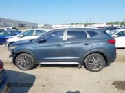 ✅ 2021 Hyundai Tucson Sport • VIN: KM8J33AL4MU339313 • Lot: 42930618. Listed on IAAI with 90,073 mi. Free auction sales archive from the USA and detailed vehicle history report at DreamBid. Image 14.