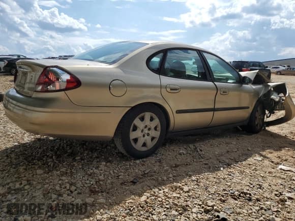 ✅ 2001 Ford Taurus LX • VIN: 1FAFP52U81A170546 • Lot: 81728555. Listed on Copart with 129,949 mi. Free auction sales archive from the USA and detailed vehicle history report at DreamBid. Image 3.