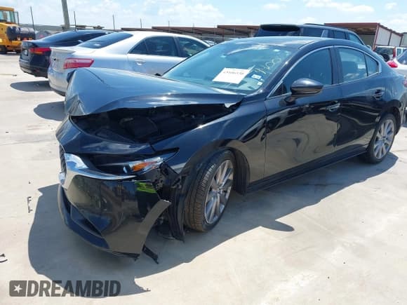 ✅ 2021 Mazda 3 Select • VIN: JM1BPABLXM1324400 • Lot: 43106530. Listed on IAAI with 99,708 mi. Free auction sales archive from the USA and detailed vehicle history report at DreamBid. Image 2.
