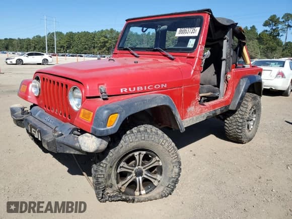 ✅ 2003 Jeep Wrangler Rubicon • VIN: 1J4FA69S43P373014 • Lot: 86863735. Listed on Copart with 120,127 mi. Free auction sales archive from the USA and detailed vehicle history report at DreamBid. Image 1.