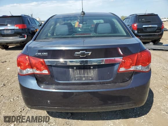 ✅ 2015 Chevrolet Cruze LS • VIN: 1G1PA5SHXF7288856 • Lot: 80012745. Listed on Copart with 103,149 mi. Free auction sales archive from the USA and detailed vehicle history report at DreamBid. Image 6.