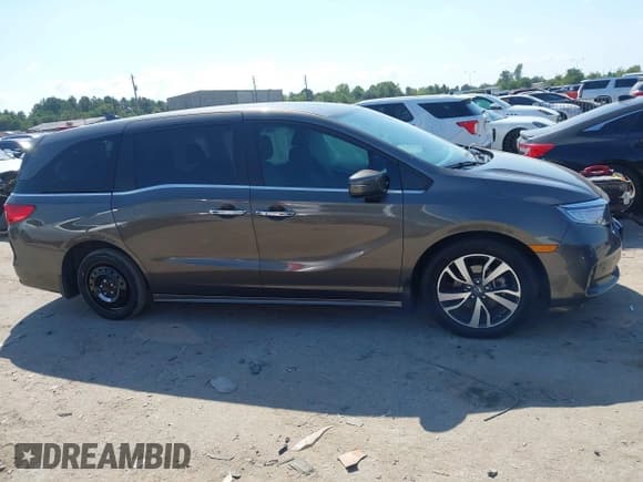 ✅ 2023 Honda Odyssey Touring • VIN: 5FNRL6H85PB034832 • Lot: 43372970. Listed on IAAI with 43,980 mi. Free auction sales archive from the USA and detailed vehicle history report at DreamBid. Image 12.