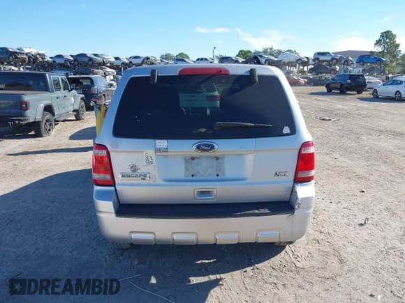 ✅ 2012 Ford Escape XLT • VIN: 1FMCU0DG7CKB62771 • Lot: 43605120. Listed on IAAI with 173,264 mi. Free auction sales archive from the USA and detailed vehicle history report at DreamBid. Image 17.