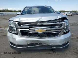 ✅ 2020 Chevrolet Suburban Premier • VIN: 1GNSCJKC0LR216855 • Lot: 72287114. Wystawiony na Copart z przebiegiem 94 642 mil. Bezpłatny archiwum sprzedaży aukcyjnych z USA i szczegółowy raport historii pojazdu na DreamBid. Zdjęcie 5.