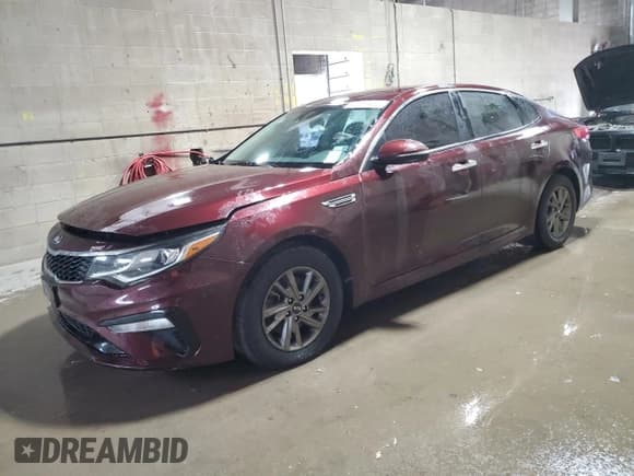 ✅ 2019 Kia Optima LX • VIN: 5XXGT4L30KG329169 • Лот: 90655435. Опубликован ранее на Copart с пробегом 108 499 миль. Бесплатный доступ к архиву аукционных продаж из США и подробный отчёт об истории автомобиля на DreamBid. Изображение 1.