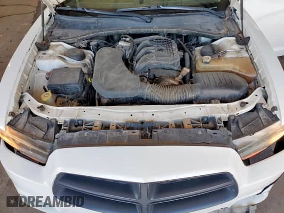 2012 Dodge Charger SXT Plus z VIN 2C3CDXHG6CH278899, wystawiony jako Copart lot #82220655 z przebiegiem 185 929 mil mil oraz Szkoda całkowita • Salvage title. Historia ofert i sprzedaży dostępna na DreamBid. Obrazek 11.