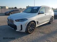 ✅ 2025 BMW X5 xDrive50e • VIN: 5UX43EU09S9X76513 • Lot: 43775730. Listed on IAAI with 17,858 mi. Free auction sales archive from the USA and detailed vehicle history report at DreamBid. Image 2.