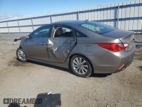 ✅ 2014 Hyundai Sonata Limited • VIN: 5NPEC4AB8EH948628 • Lot: 85384965. Listed on Copart with 127,240 mi. Free auction sales archive from the USA and detailed vehicle history report at DreamBid. Image 2.