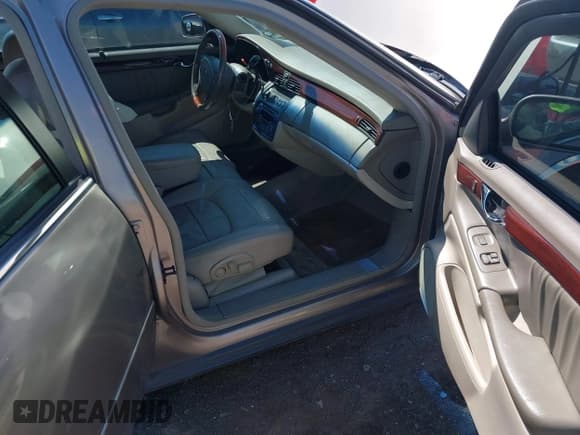 ✅ 2004 Cadillac DeVille DHS • VIN: 1G6KE54Y04U130501 • Lot: 42318769. Listed on IAAI with 81,512 mi. Free auction sales archive from the USA and detailed vehicle history report at DreamBid. Image 5.