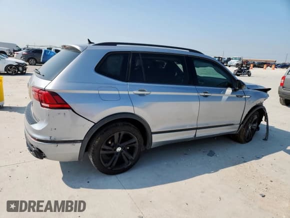 ✅ 2024 Volkswagen Tiguan SE R-Line Black • VIN: 3VVCB7AX7RM054192 • Лот: 71907165. Опубликован ранее на Copart с пробегом 20 299 миль. Бесплатный доступ к архиву аукционных продаж из США и подробный отчёт об истории автомобиля на DreamBid. Изображение 3.