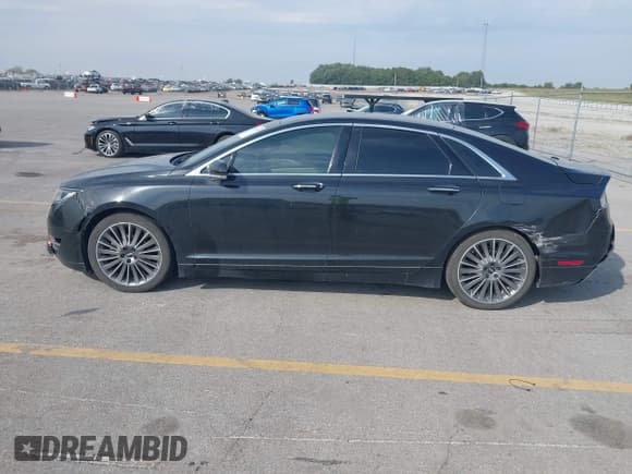 ✅ 2014 Lincoln MKZ Hybrid • VIN: 3LN6L2LU3ER804887 • Lot: 43212099. Listed on IAAI with 195,399 mi. Free auction sales archive from the USA and detailed vehicle history report at DreamBid. Image 14.