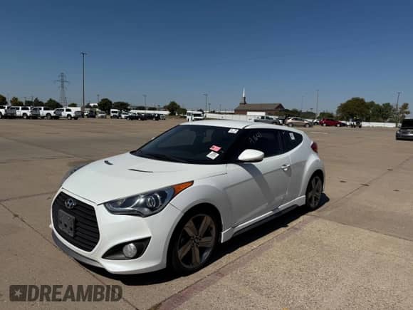 2015 Hyundai Veloster Turbo с VIN KMHTC6AE1FU230029, выставлен на аукционе Copart как лот 74982304 с пробегом 121 447 миль миль и Чистый • Clean title. История ставок и продаж доступна на DreamBid. Изображение 2.